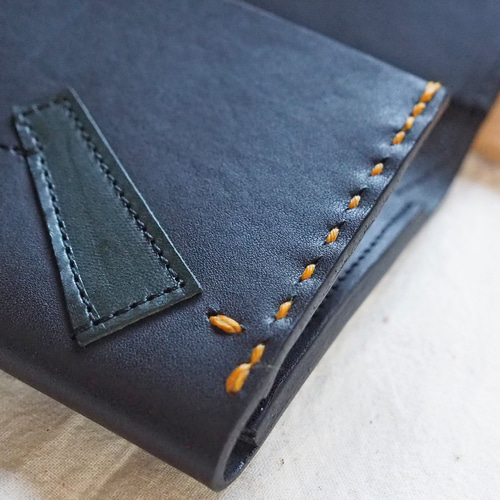 ブラックレザーパッチワーク二つ折り財布 compass1719546626.jpg