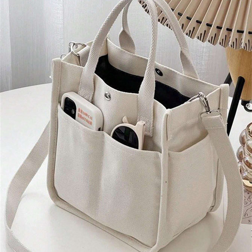 シンプルで多目的な多機能キャンバストートバッグ、複数のポケットと
