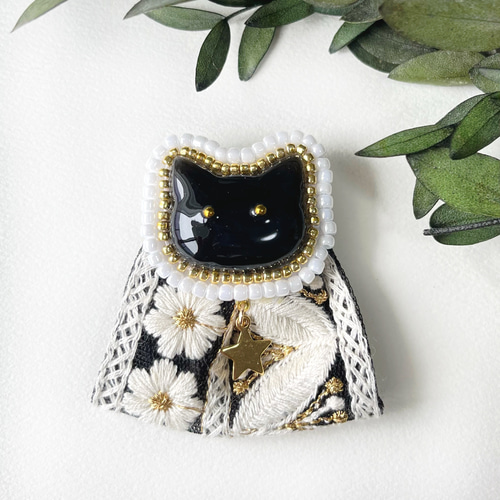 猫のインド刺繍リボンポケットの裏起毛パンツ 退い