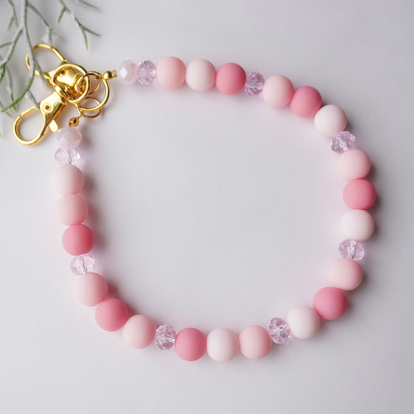 桜ピンクのスマホハンドストラップ ビーズ お出かけ デイリー 大人