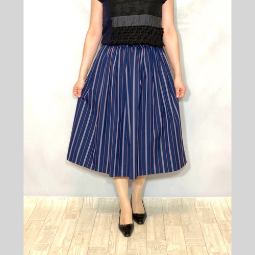 【ROTATE】ライトブルー スカート (きらめくアップリケ付き) スターライドビジュースカート[品番：MKSW0057686]｜dazzlin