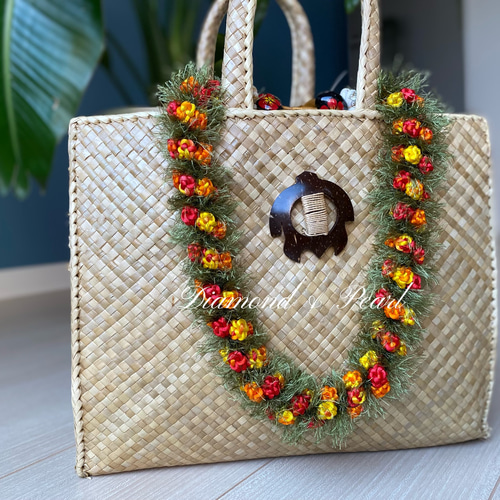 オレンジ系のクロシェットレイ ハワイアンリボンレイ ハワイアンレイ