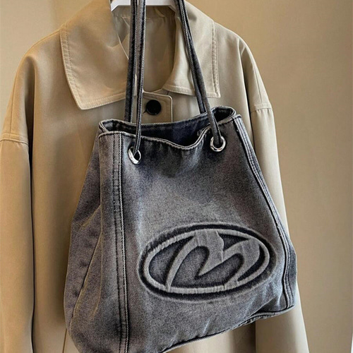 エンボス加工 黒 ハンドバッグ COACH ブラック エンボス加工 ハンドバッグ
