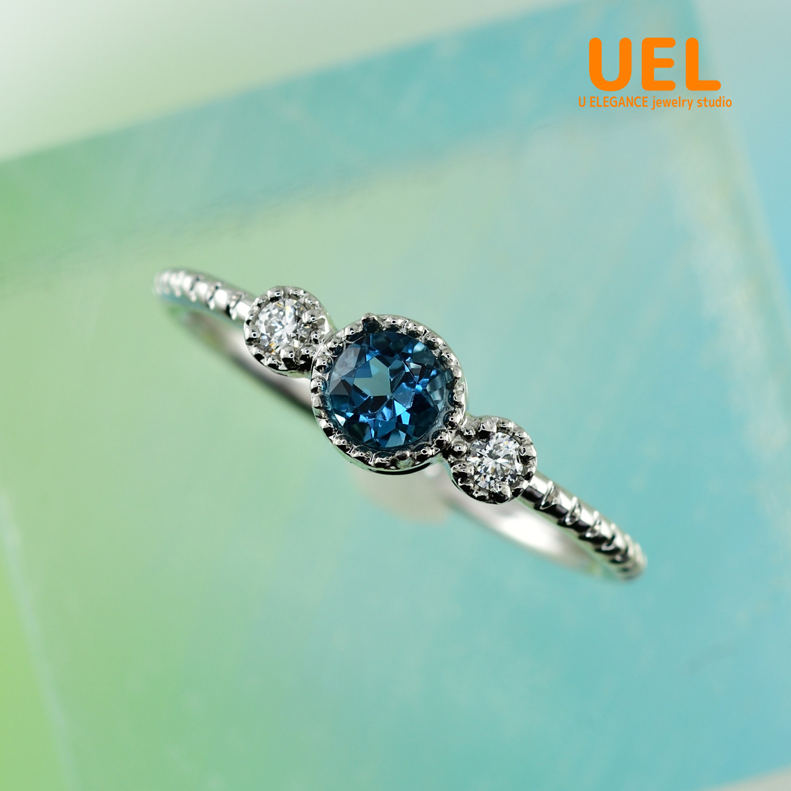 シルバー925　ロンドンブルートパーズ　ホワイトジルコン　3石ディリット（一文字）リング