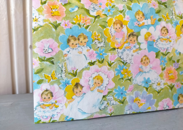U.S.A. ヴィンテージ包装紙【お花畑のベビー】DA-WP077 1枚目の画像