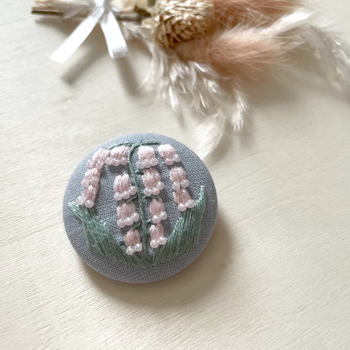 ピンクのすずらん刺繍ヘアゴム くるみボタン ブローチ cocomu 通販 