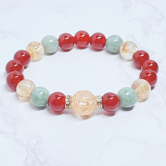 還暦祝いに◎長寿と笑顔をつなぐ 天然石ブレスレット｜龍彫り水晶・赤