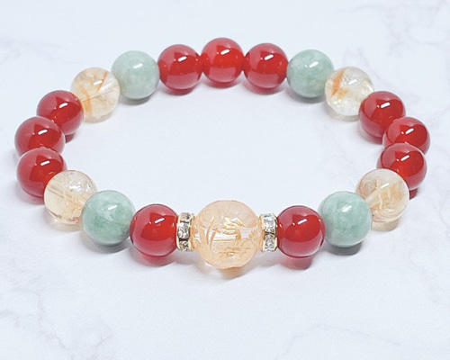 還暦祝いに◎長寿と笑顔をつなぐ 天然石ブレスレット｜龍彫り水晶・赤
