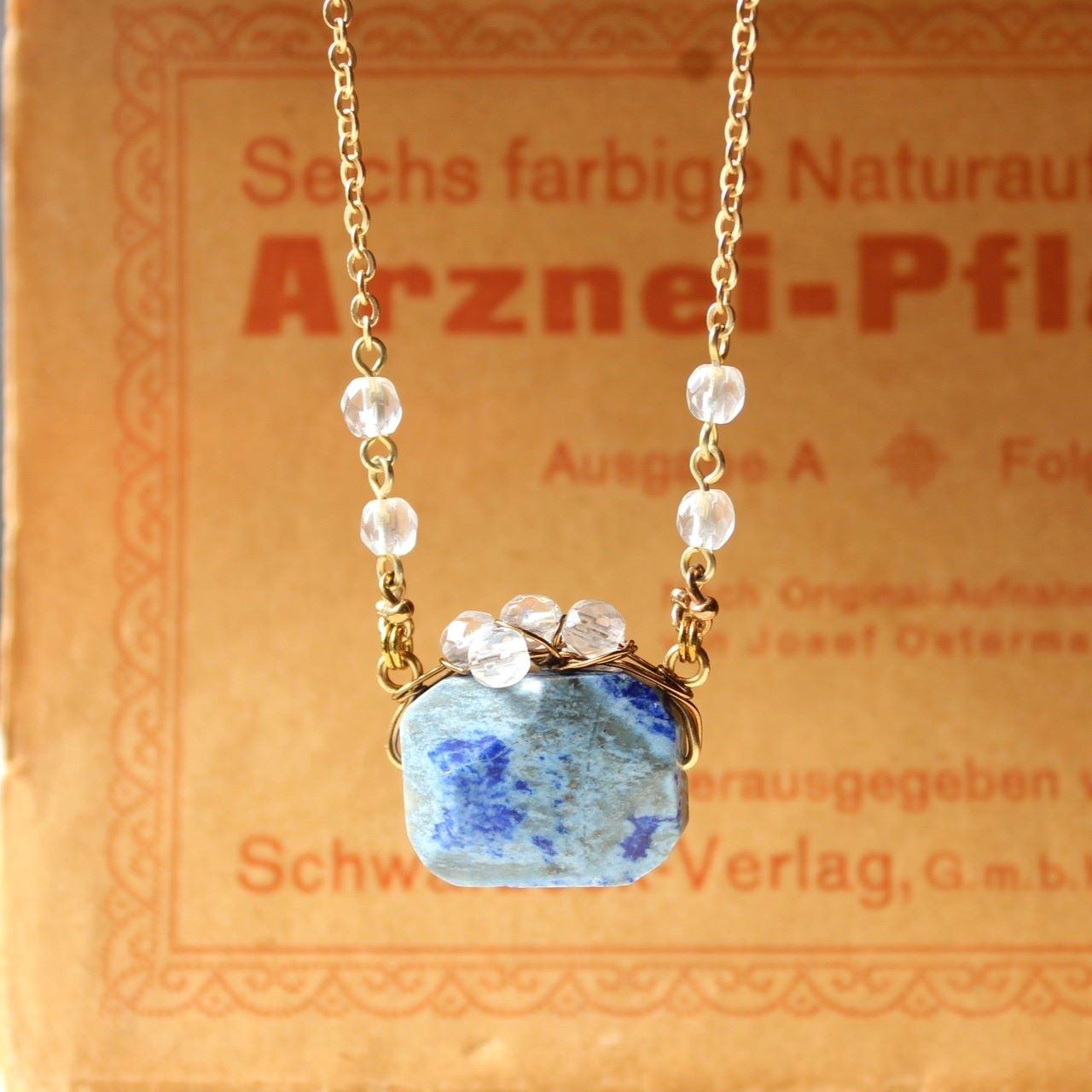 ポルトモネ・ラピスラズリ・水晶　フランスのがま口 　ペンダント・ネックレス　マットゴールド