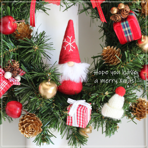サンタクロースのプレゼント クリスマスリース メリークリスマス