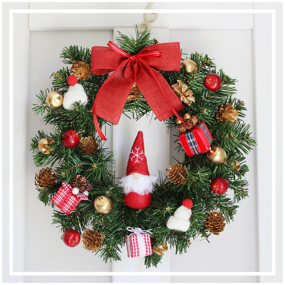 サンタクロースのプレゼント クリスマスリース メリークリスマス