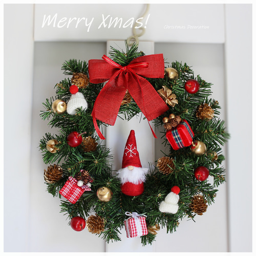 サンタクロースのプレゼント クリスマスリース メリークリスマス