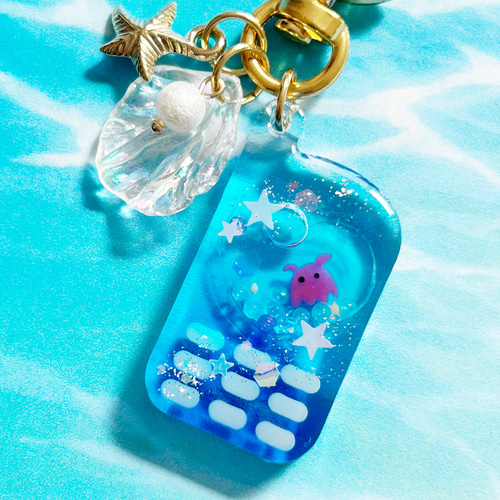 海をつめこんだ　ハンドメイドキーホルダー 蓄光*・゜メンダコのガラケー キーホルダー✽.。水色 ブルー 青