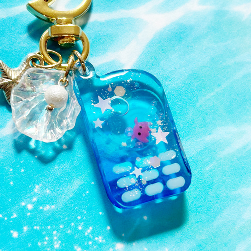 蓄光星たっぷり水色スターシェイカーキーホルダー　レジン　シャカシャカ　キラキラ 蓄光ホログラム水色スターシェイカーキーホルダー レジン シャカシャカ