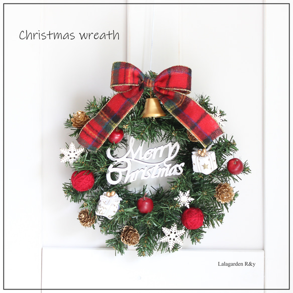 赤いタータンチェックのクリスマスリース メリークリスマス クリスマス
