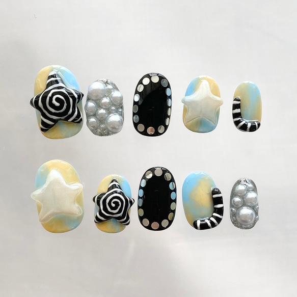 サイズオーダー】ぐるぐる星ネイルチップ 個性派 y2k ぷっくり 水色