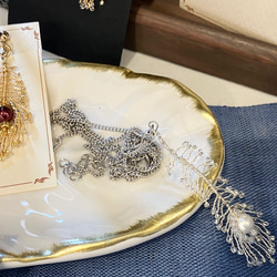 孔雀の羽根イヤリング・ピアス 6枚目の画像