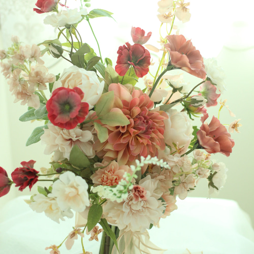 テラコッタカラーのクラッチブーケ ウェディングブーケ ウェディング