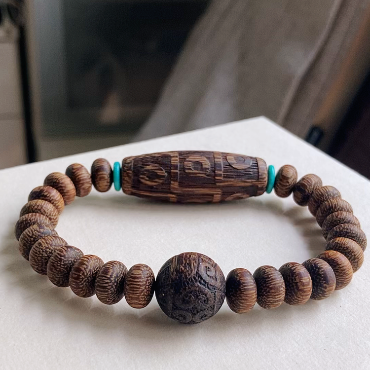 ～漆塗り木製ビーズのアクセント付き～ 【希少品】天眼模様の木製念珠ブレスレット