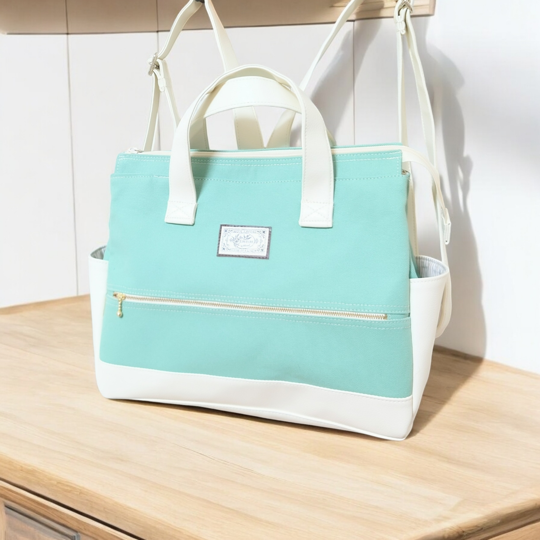 ミント帆布と白の合皮の四角いリュック(横型）（3way）（受注製作)