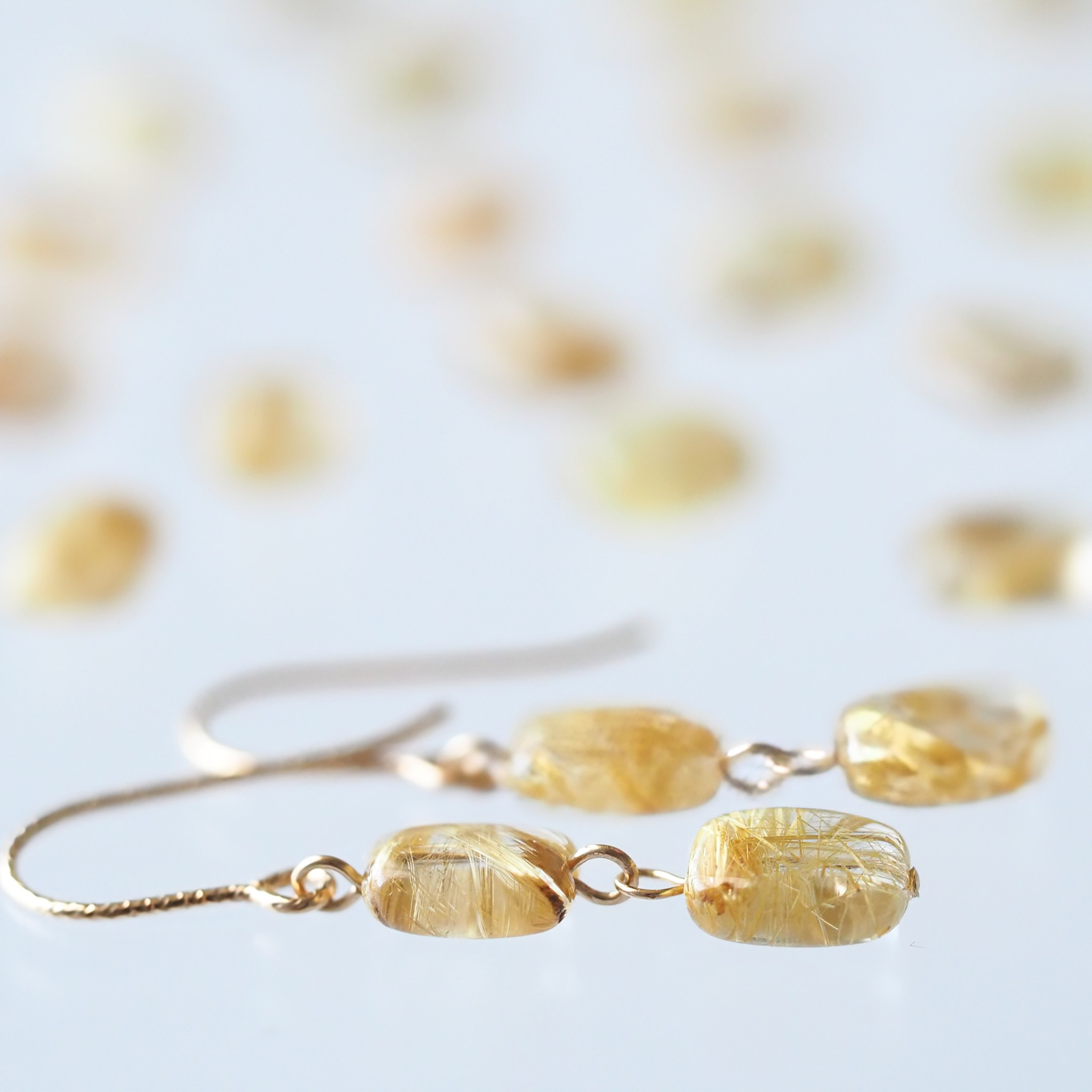 《ルチルクォーツの2連ピアス》