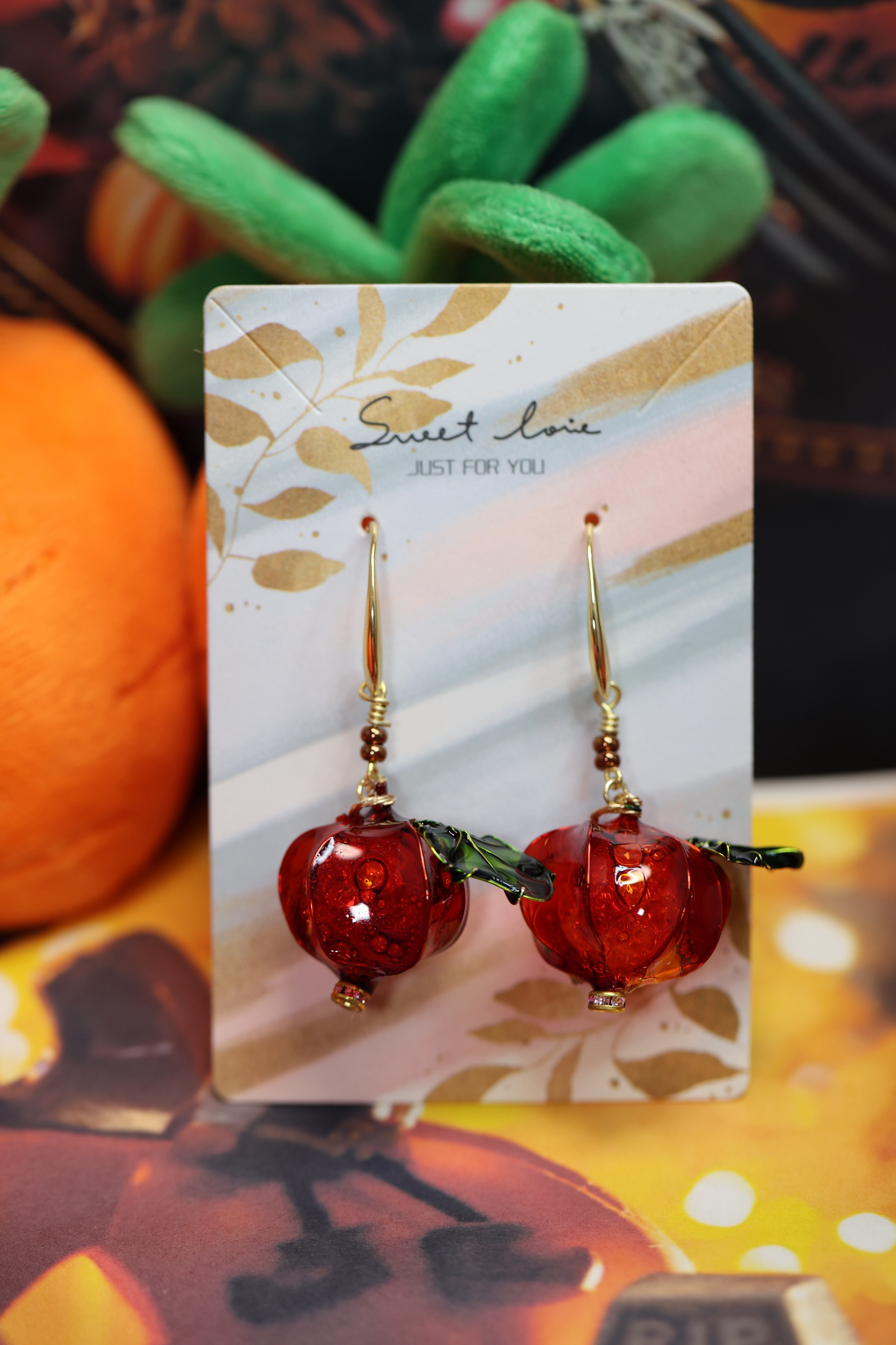 ハロウィンの可愛くて毒毒しいかぼちゃのピアス ピアス（フック