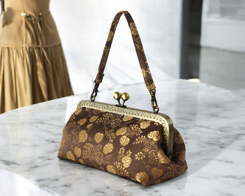 華やかな金茶葵紋帯リメイクがま口バッグ/クリスマスやイベントに