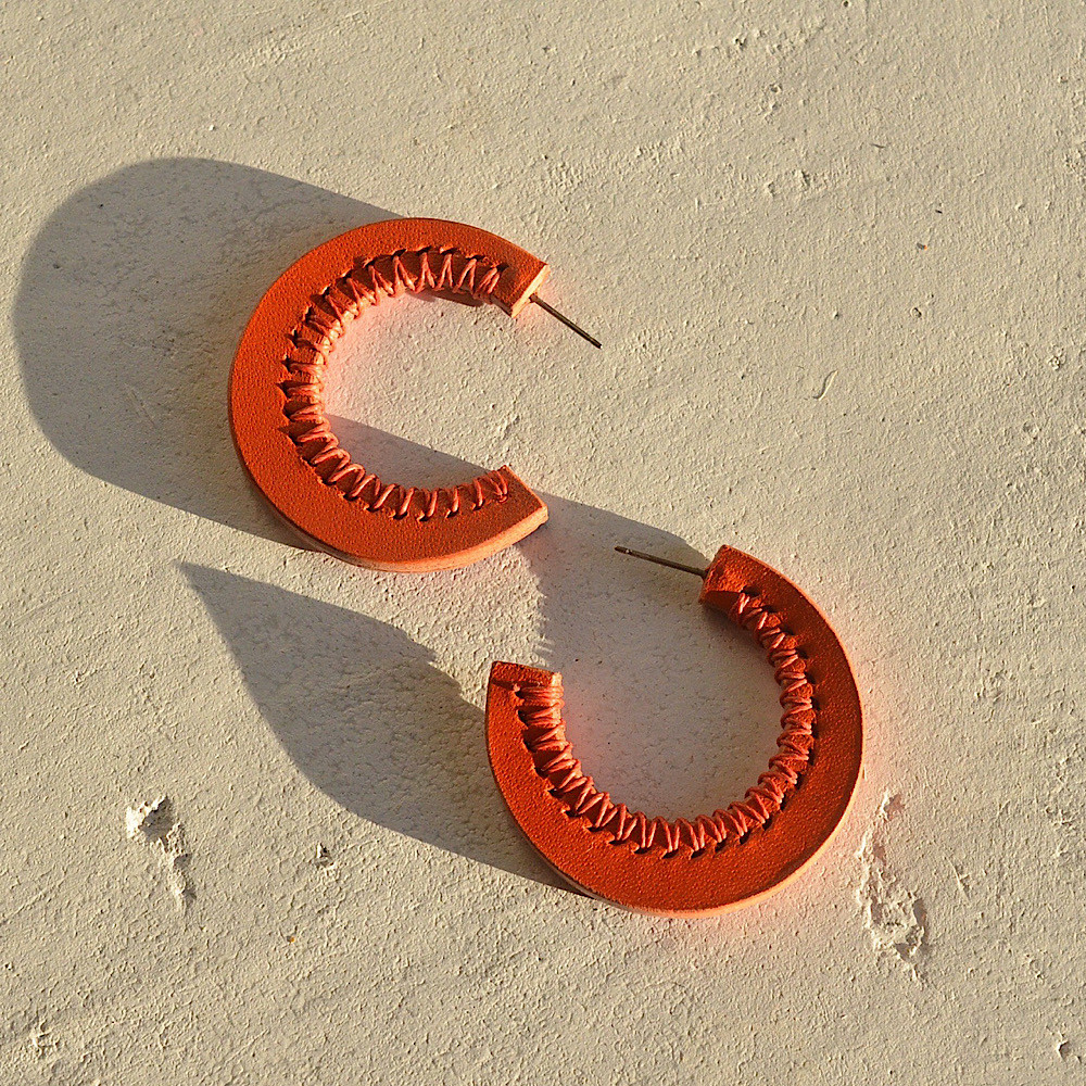 C【レザーピアス】 “orange” 4,544円