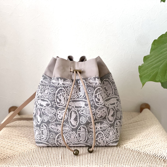 ミナペルホネン jungle relief (ネイビー)ショルダーバック ⚮̈ミナペルホネン jungle relief シプリバッグ 巾着ショルダー