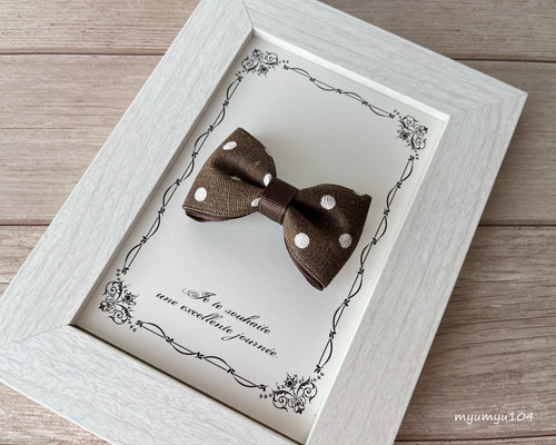 ブラウン×ドットリボンのヘアクリップ ／ ベビー キッズ 滑り止め付き