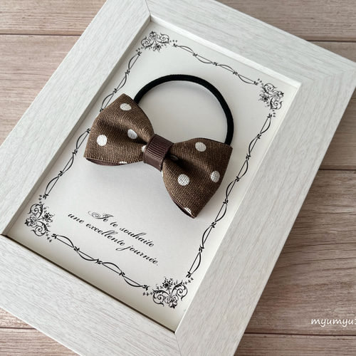 ブラウン×ドットリボンのヘアクリップ ／ ベビー キッズ 滑り止め付き