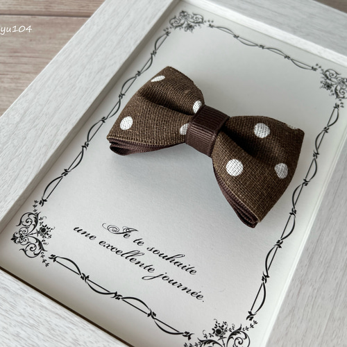 ブラウン×ドットリボンのヘアクリップ ／ ベビー キッズ 滑り止め付き