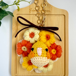 モリーの花のリースに囲まれて オカメインコのあみぐるみバッグ