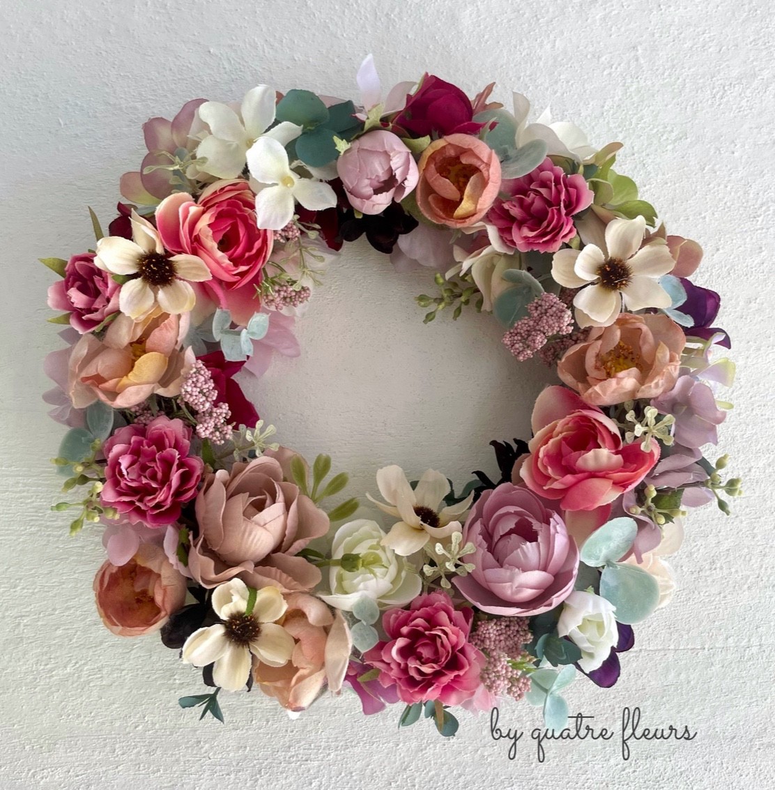 クリームコスモスとオレンジピンクのミニリース