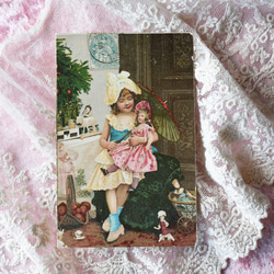 アンティークポストカード 1906年のクリスマスの可愛い少女とお人形