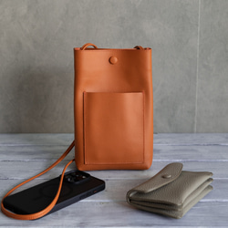 義大利真皮垂直手拿包，防水，輕巧迷你包，單肩包[橘色] 第2張的照片