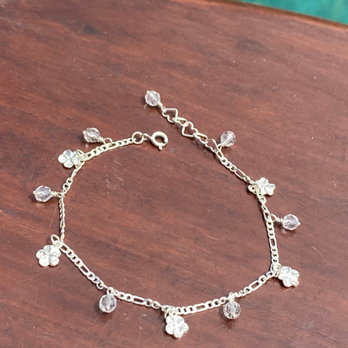 プルメリアとジルコニアがキラリと華やかな チェーン ブレスレット