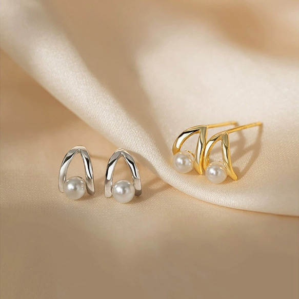 耳環，珍珠，鏤空，一顆珍珠，一顆珍珠 第1張的照片