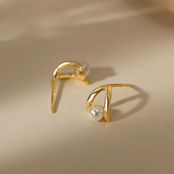 耳環，珍珠，鏤空，一顆珍珠，一顆珍珠 第2張的照片