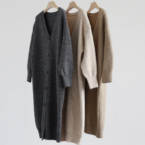 秋冬ファッション.大きなセーターのコート.厚手ロングニット