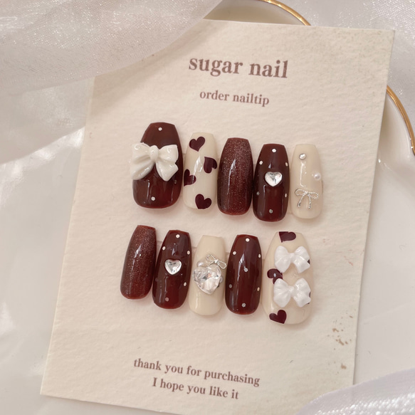 【オーダー】ネイルチップ　ボルドー　キラキラリボン手書きハート　ワンホン韓国 3779470bb27d56806599bfc2b25417