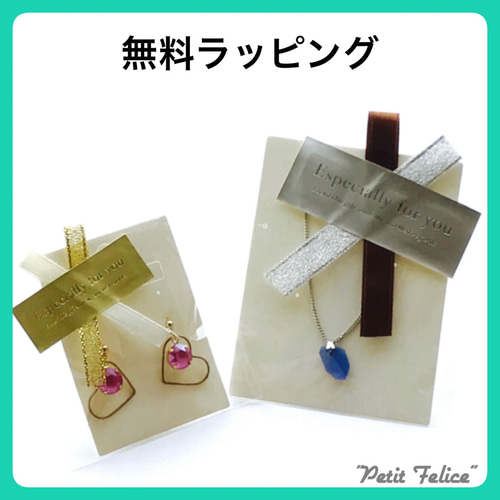 刺繍糸で編んだリングワークの中で花びらとラインストーンが揺れる