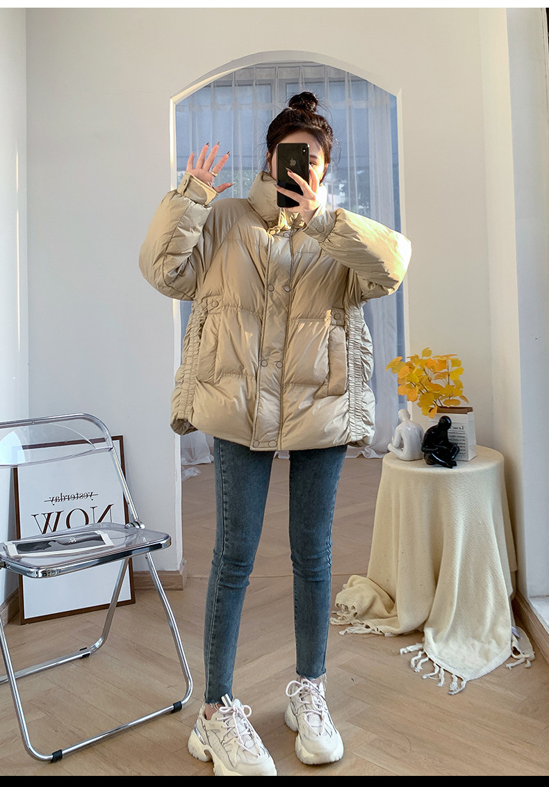 スタンドカラーのダウンジャケット女性の白いアヒルの毛冬の新しい小柄で短い白いアヒルの毛のゆったりとした保温と厚手のコート