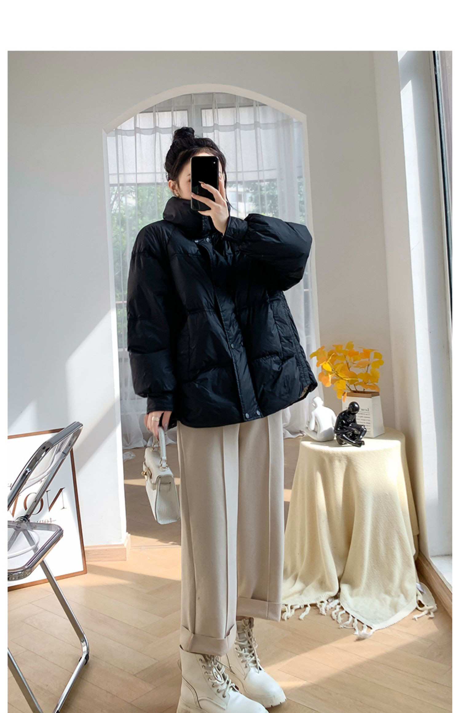 スタンドカラーのダウンジャケット女性の白いアヒルの毛冬の新しい小柄で短い白いアヒルの毛のゆったりとした保温と厚手のコート