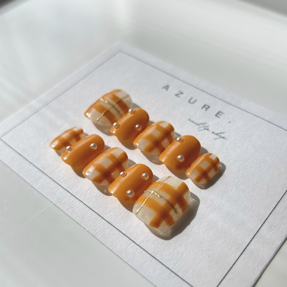 ナチュラルネイルチェック柄ツヤネイルオレンジネイル春ネイルニュアンスネイルミラーネイルオフィスネイルネイルチップ振袖冬春 2枚目の画像