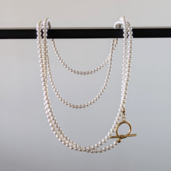 超長款日本貝殼珍珠項鍊及耳環套裝。正式場合配戴，採用醫用級不鏽鋼材質。是聖誕節和新年的完美選擇。 第3張的照片