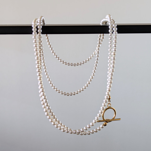 超長款日本貝殼珍珠項鍊及耳環套裝。正式場合配戴，採用醫用級不鏽鋼材質。是聖誕節和新年的完美選擇。 第3張的照片