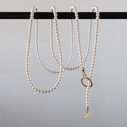 超長款日本貝殼珍珠項鍊及耳環套裝。正式場合配戴，採用醫用級不鏽鋼材質。是聖誕節和新年的完美選擇。 第7張的照片