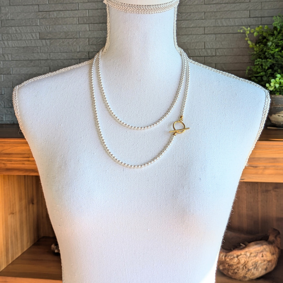 超長款日本貝殼珍珠項鍊及耳環套裝。正式場合配戴，採用醫用級不鏽鋼材質。是聖誕節和新年的完美選擇。 第4張的照片