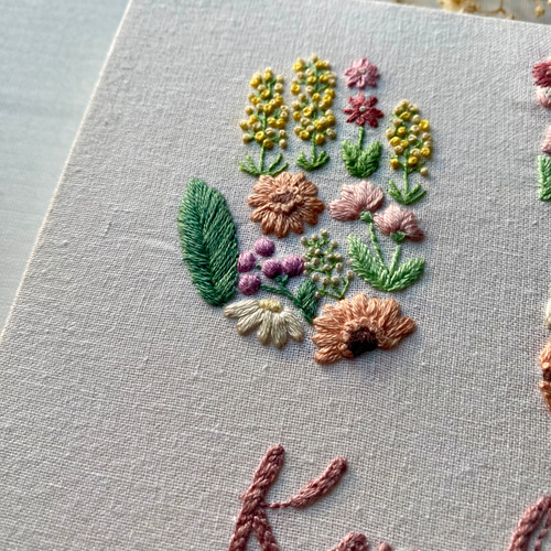 nico　手形・足形刺繍　春のお花畑 春の花畑デザイン 足形手形刺繍ボード♡メモリアルボード | Pay ID